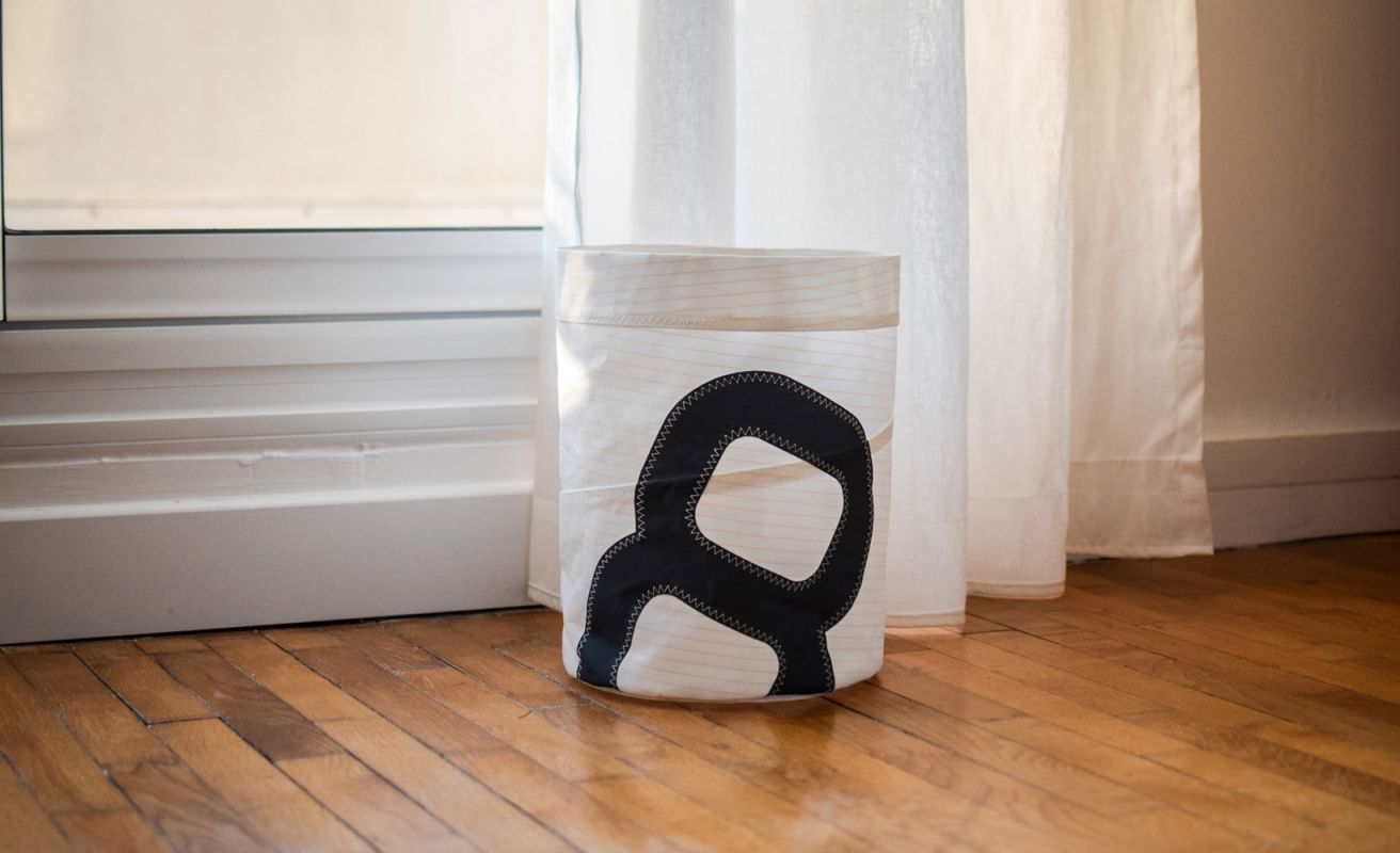 Striped wastepaper basket