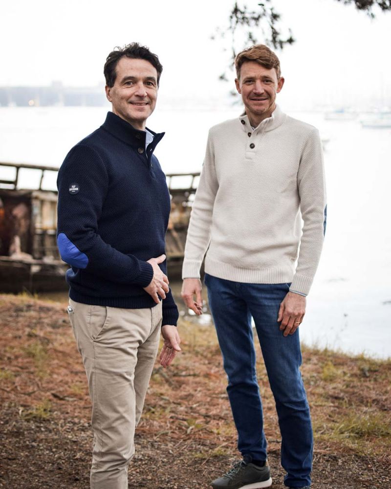 Newfoundland stand-up collar sweater · Ecru and navy merino wool