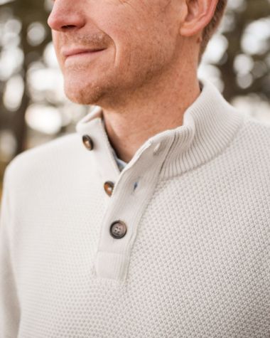 Newfoundland stand-up collar sweater · Ecru and navy merino wool 