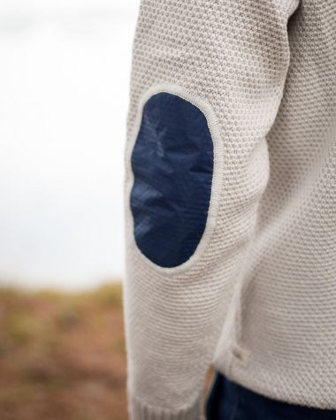 Newfoundland stand-up collar sweater · Ecru and navy merino wool