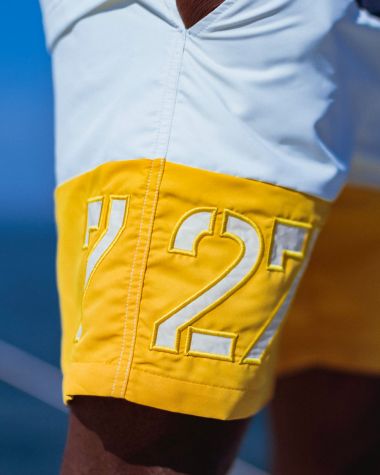 Sun Swim Short · Navy blue and yellow