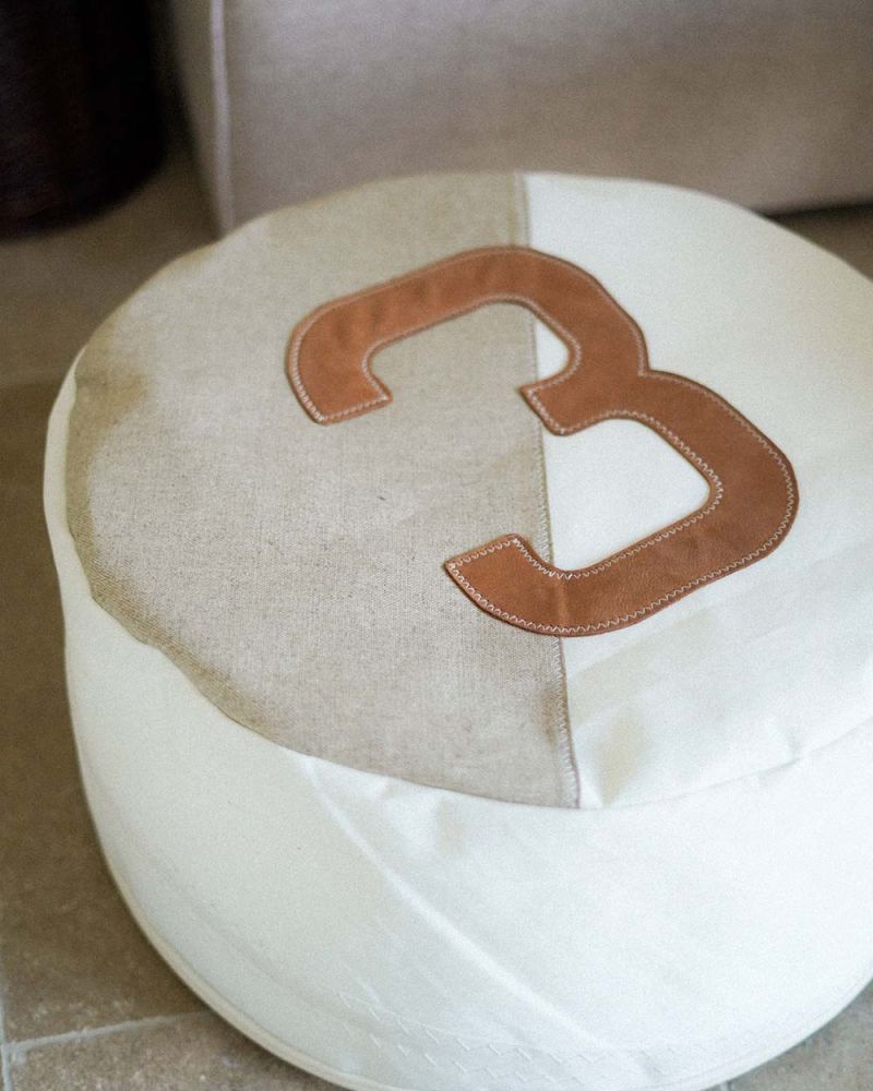 Pouf Solo ⌀54 · Lin et cuir ambre